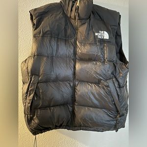 Older style men’s north face puffer vest